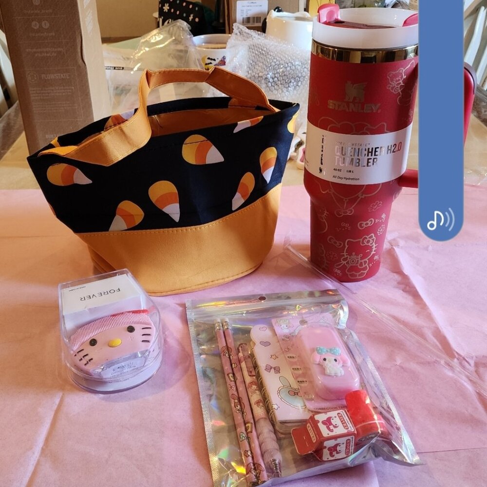 Hello Kitty Stanley with stationary treat bag and face massager